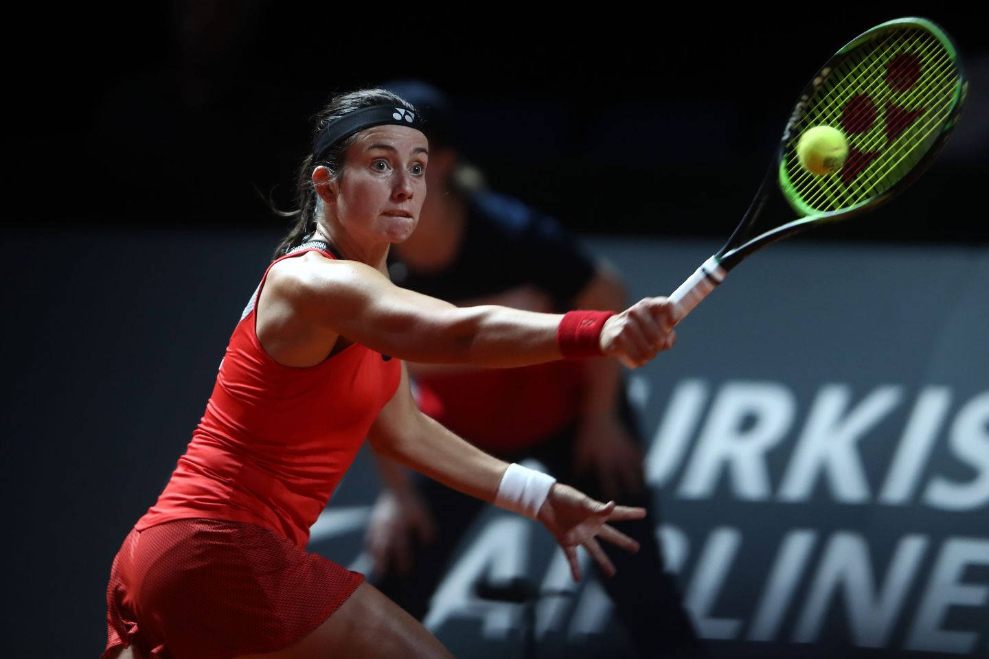 Caption: Anastasija Sevastova Dominating The Game In A Striking Red Outfit. Wallpaper