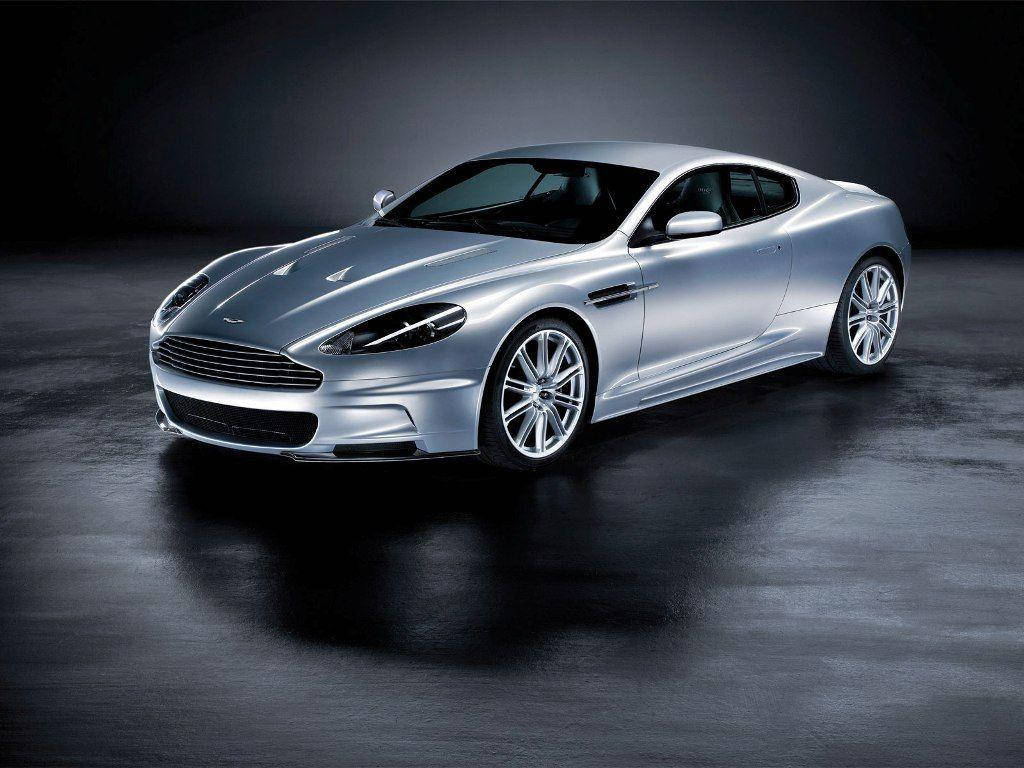 Caption: Astonishing Silver Aston Martin Performance Sports Car Wallpaper