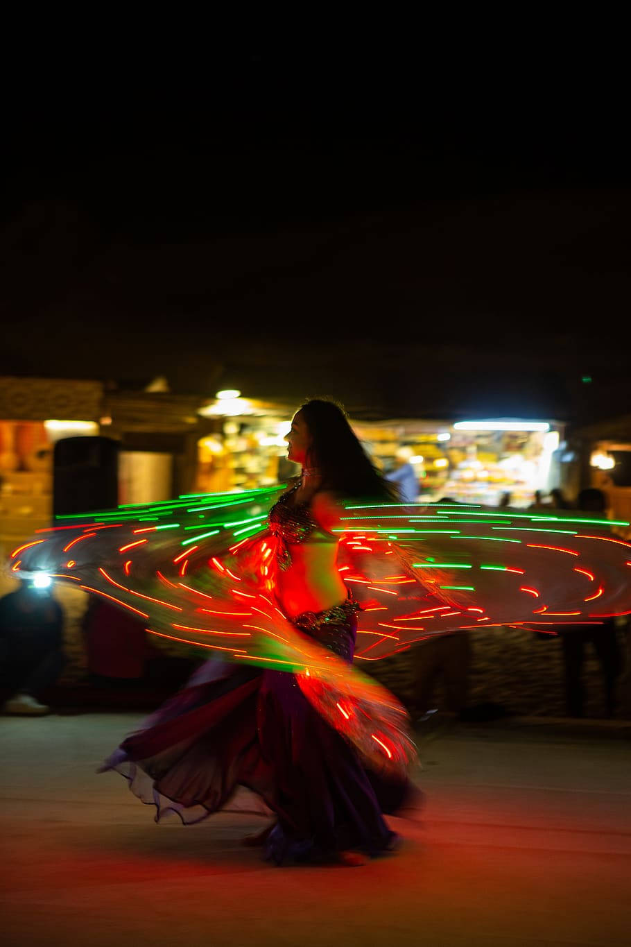 Caption: Captivating Belly Dance Pose In Motion Wallpaper