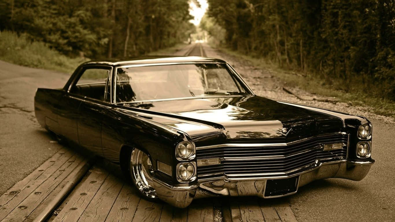 Caption: Classic Beauty - Vintage Muscle Cars Wallpaper