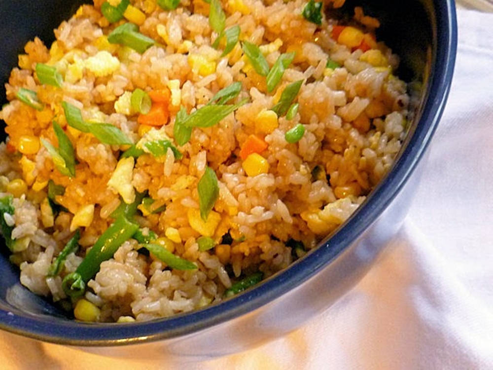 Caption: Delicious Home-cooked Fried Rice Wallpaper