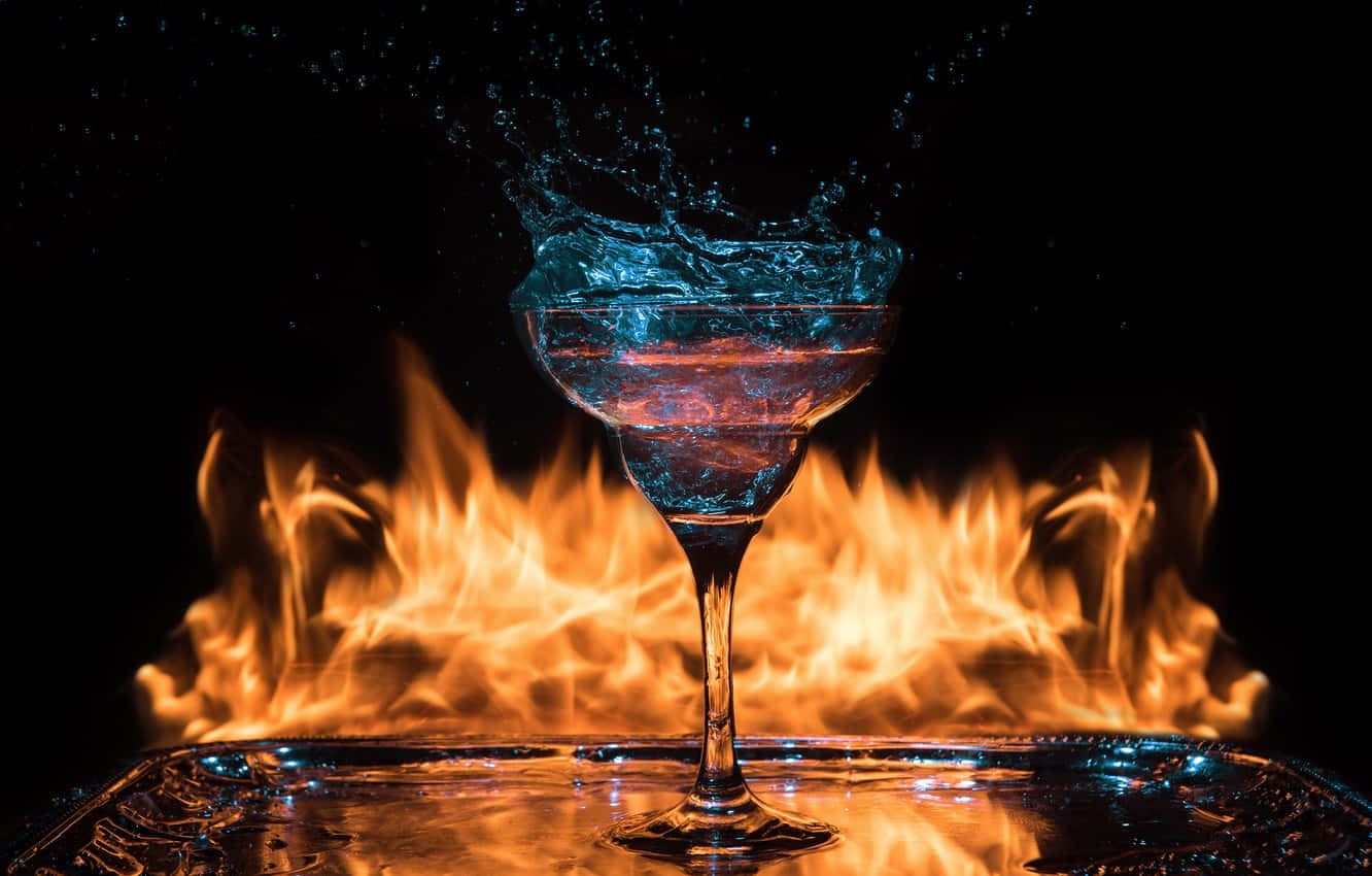 Caption: Effervescent Pink Martini Cocktail Making A Splash Wallpaper