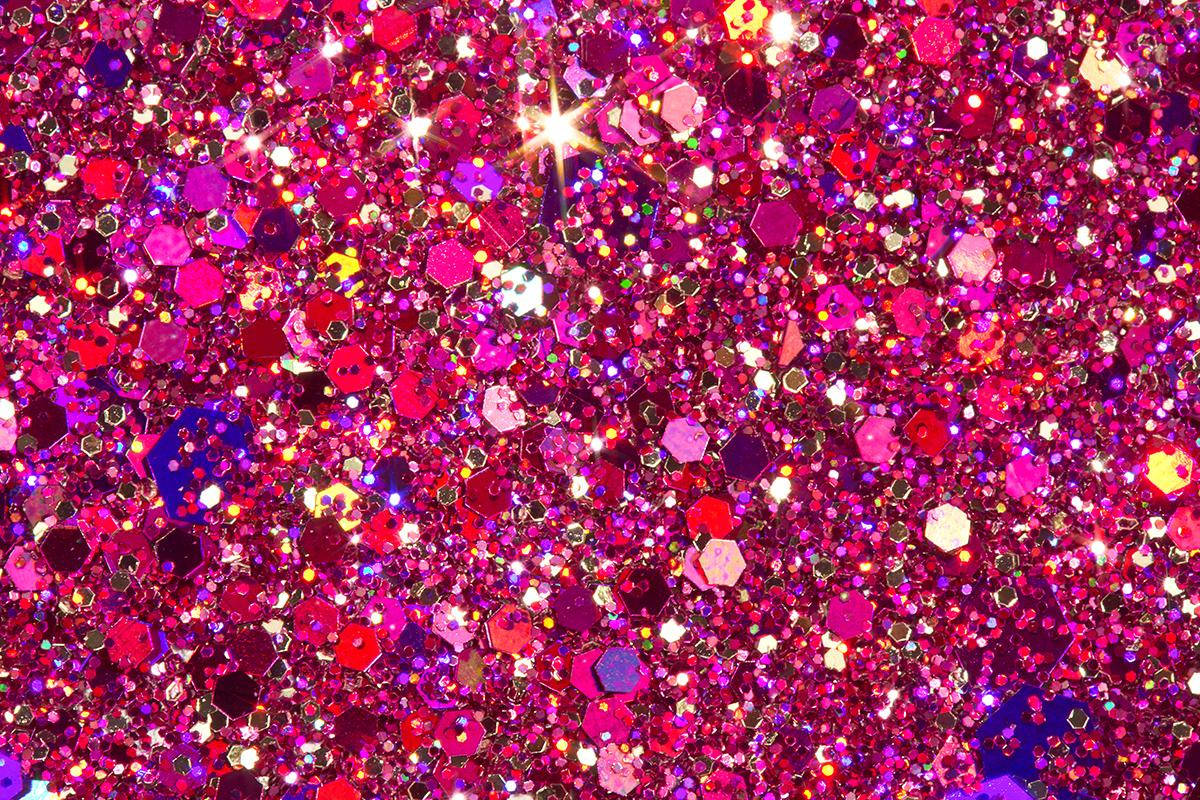 Caption: Enthralling Shower Of Sparkly Pink Glitters Wallpaper