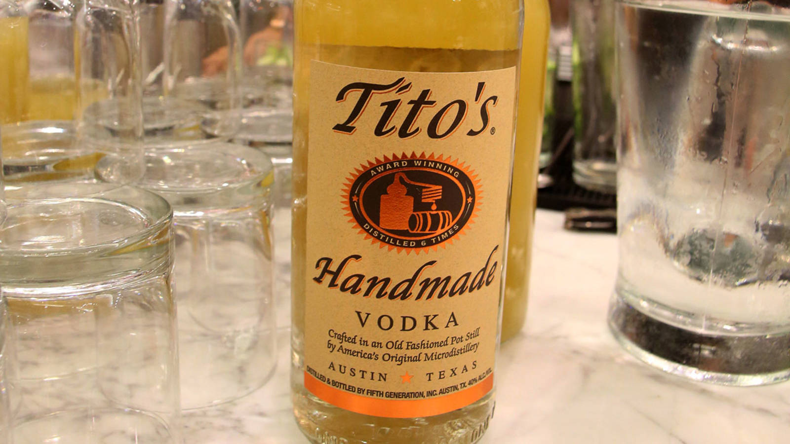 Caption: Exceptional Quality, Tito's Handmade Vodka Bottle Wallpaper