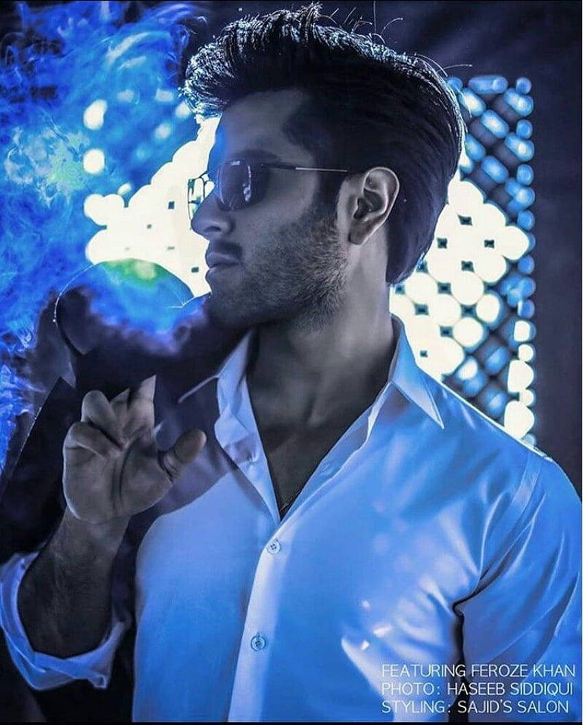 Caption: Feroz Khan Showcasing His Intensity In Blue Lighting Wallpaper