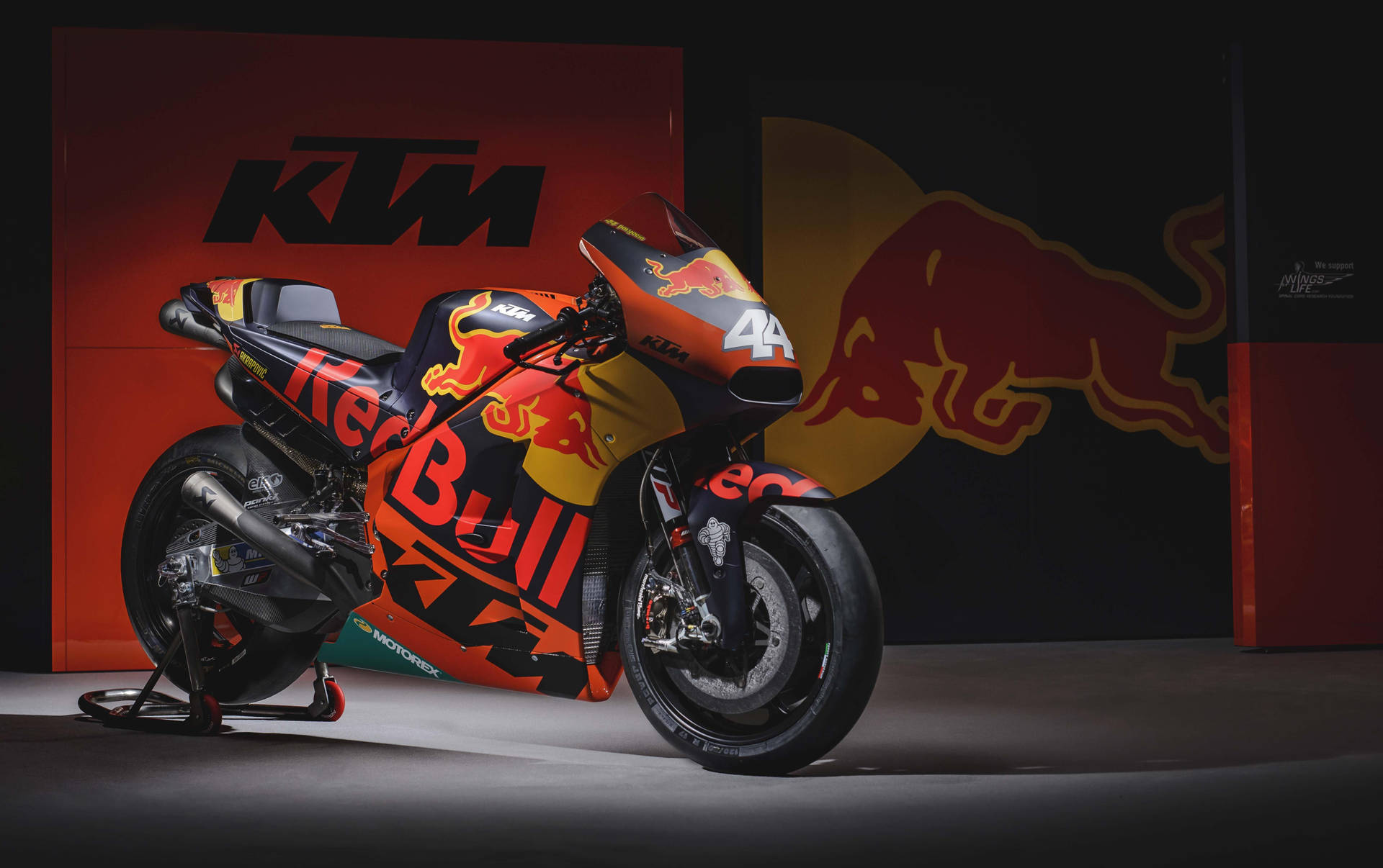 Caption: Ktm 4k Motorcycle Adorned With Red Bull Accents Wallpaper