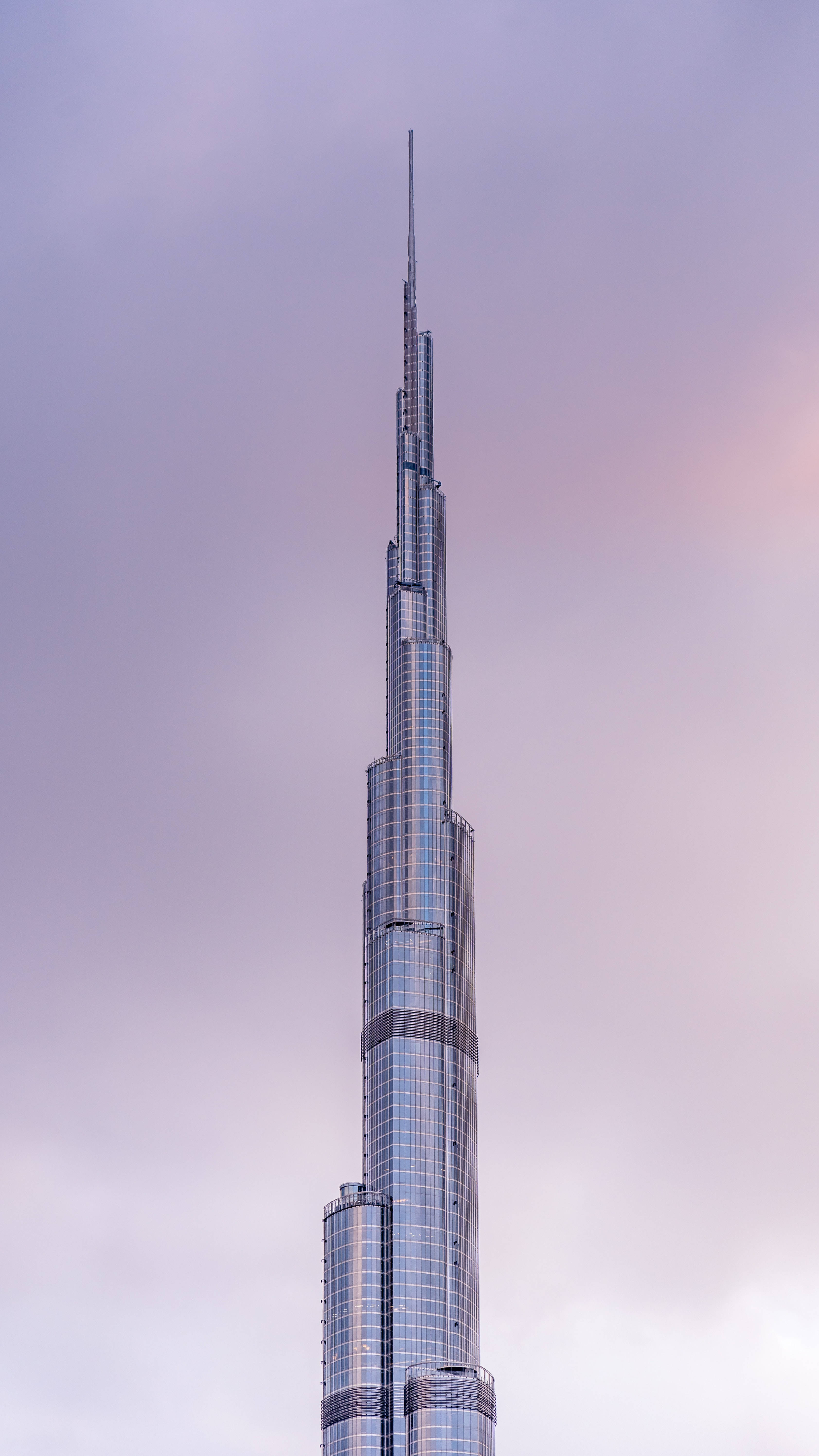 Caption: Majestic Burj Khalifa Soaring High In The Clear Sky Wallpaper