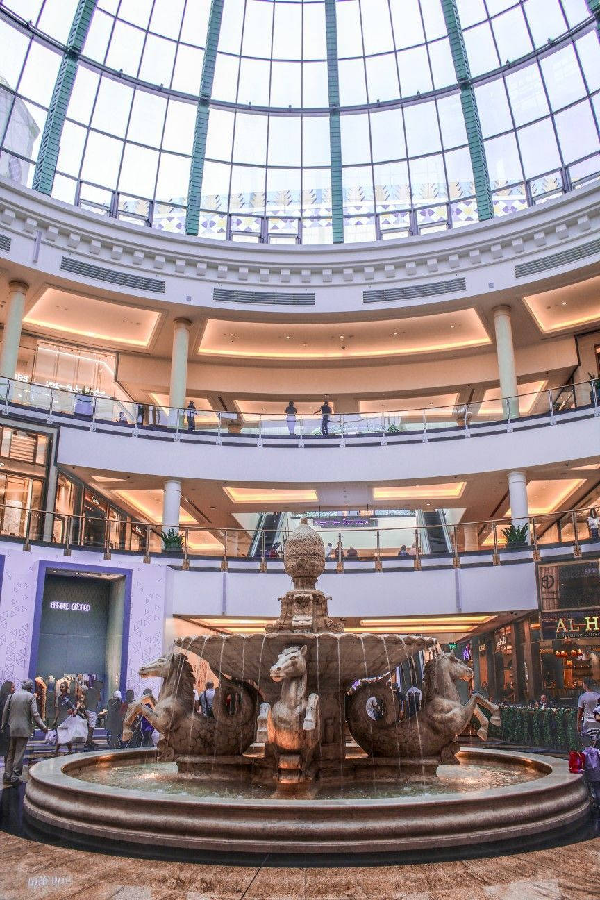 Caption: Majestic View Of Mall Of Emirates Indoor Fountain Wallpaper