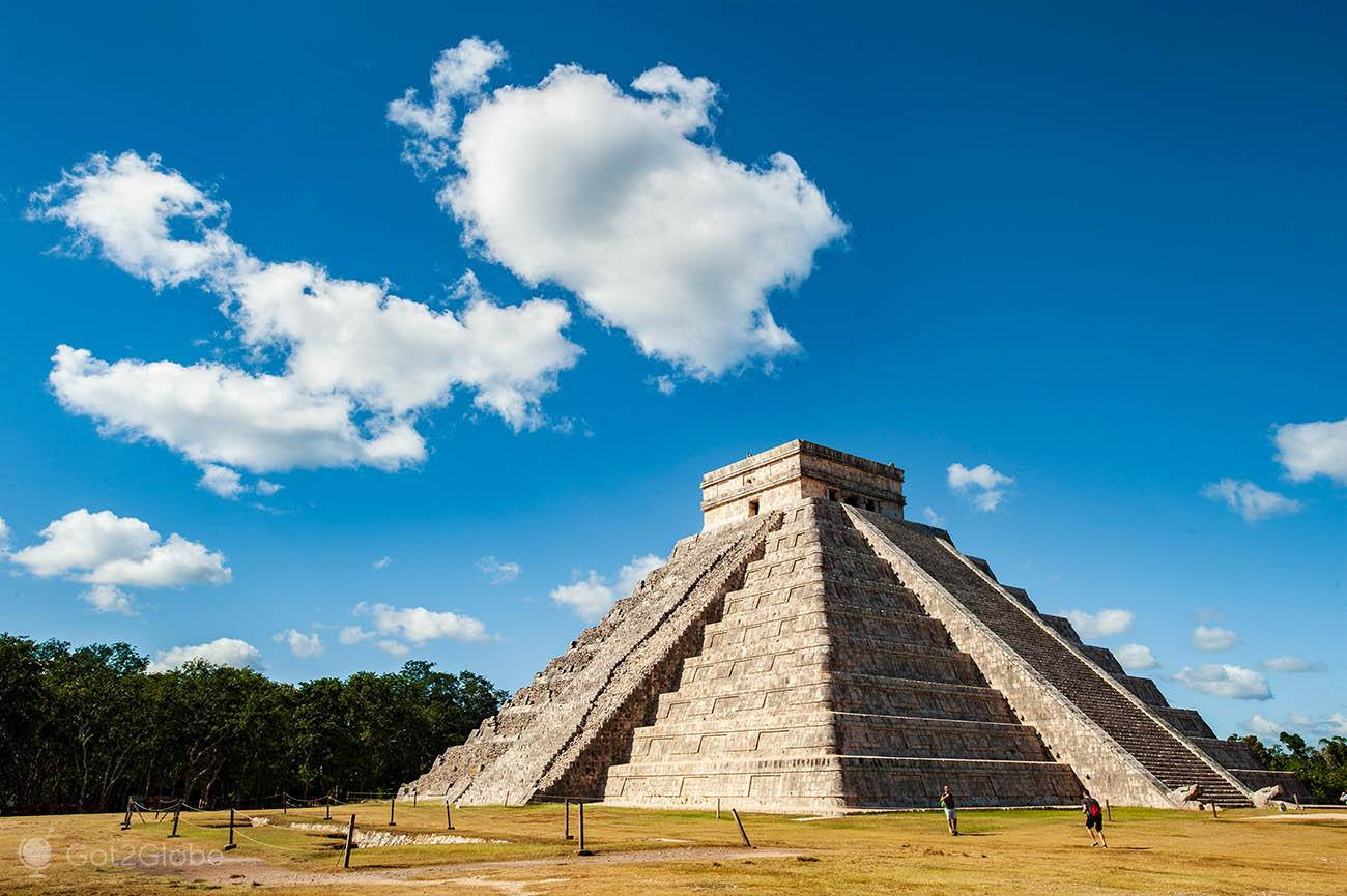 Caption: Majestic View Of The Chichen Itza Pyramid At Sunset Wallpaper