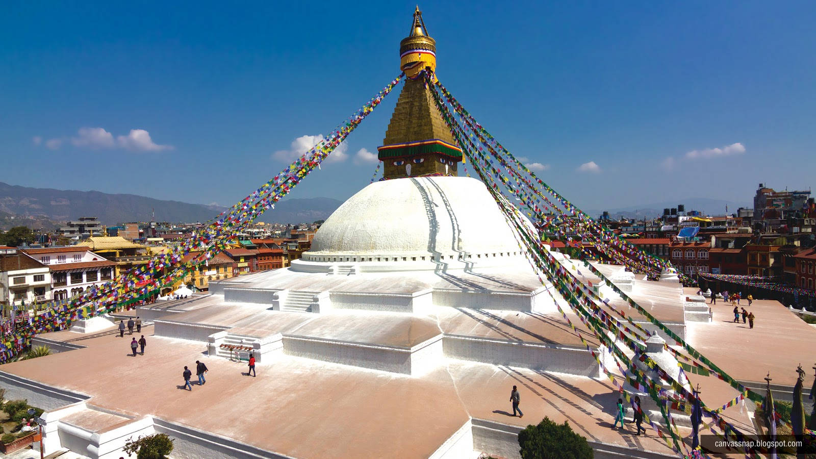 Caption: Majestic View Of The White Stupa In Kathmandu Wallpaper