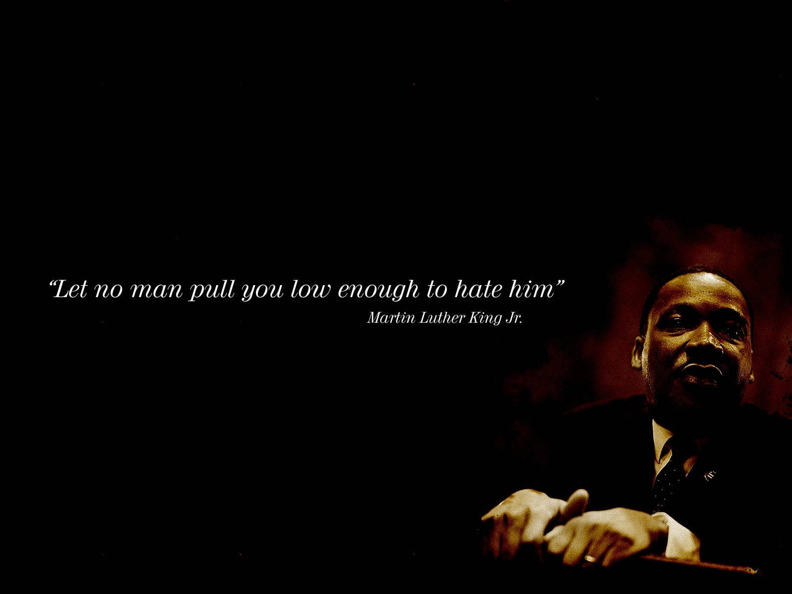 Caption: Martin Luther King Jr. Quoting Memorable Words Of Wisdom Wallpaper