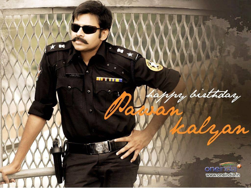 Caption: Power Star Pawan Kalyan Exudes Authority In Policeman Uniform Wallpaper