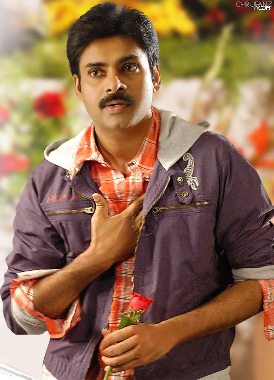 Caption: Power Star Pawan Kalyan Holding A Crimson Red Rose Wallpaper