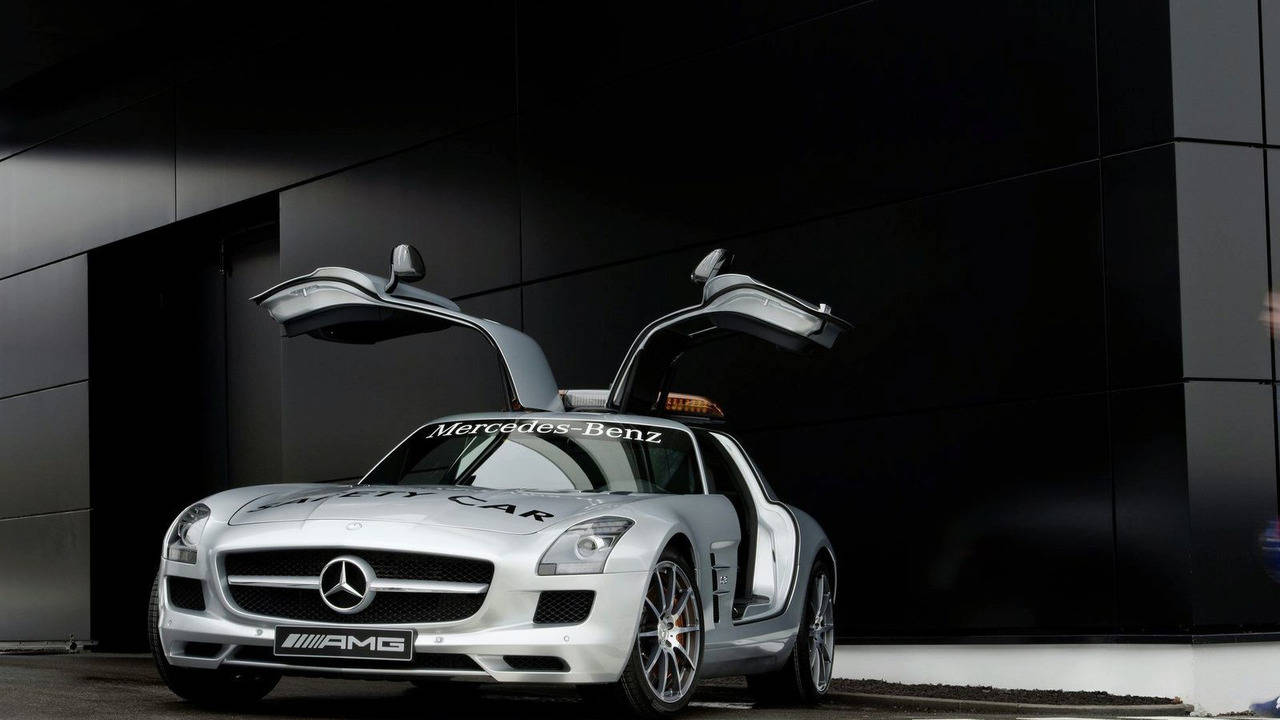 Caption: Prestigious Luxury - The White Mercedes-benz Sls Amg Wallpaper