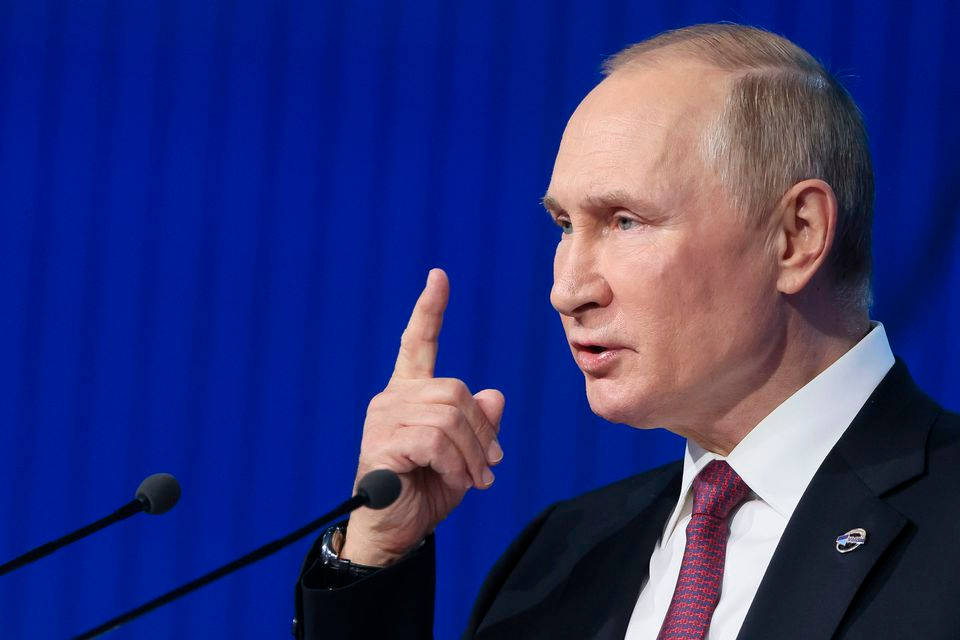 Caption: Russian President, Vladimir Putin, Making A Number 1 Hand Sign. Wallpaper