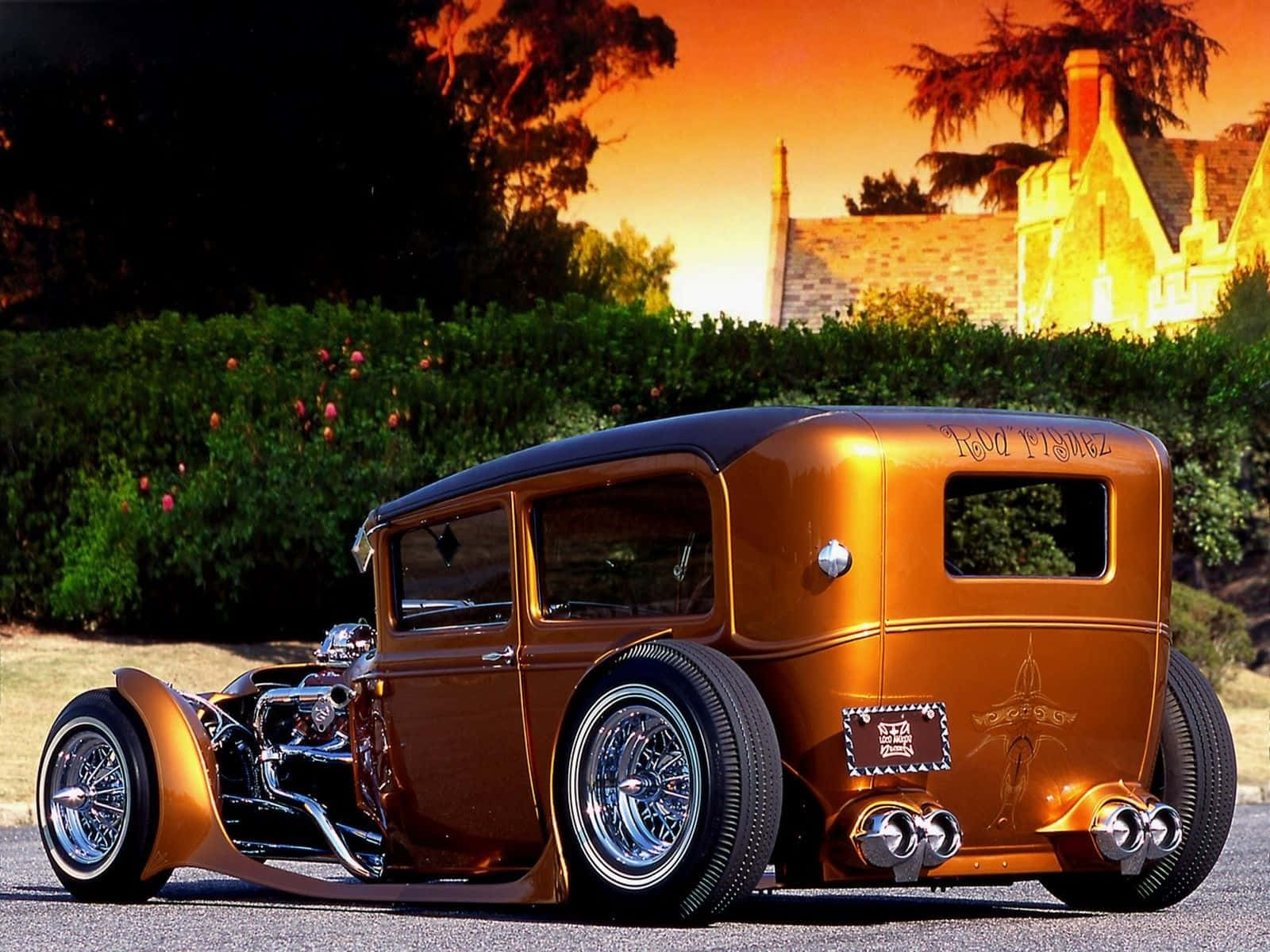 Caption: Speed And Power Unleashed: Stunning Hot Rod On The Open Road Wallpaper