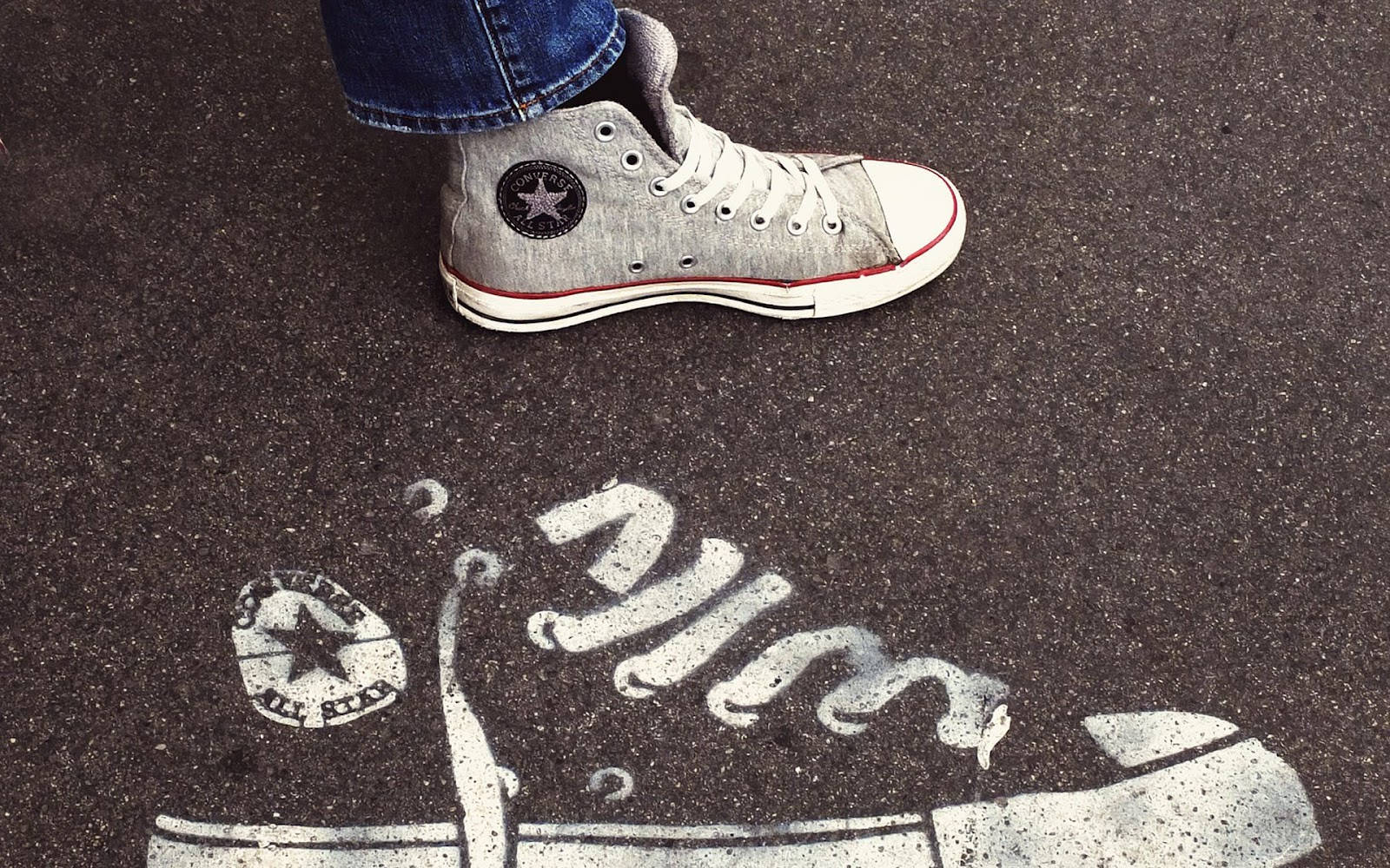 Caption: Stylish Converse Sneaker Artwork On Chalkboard Background Wallpaper