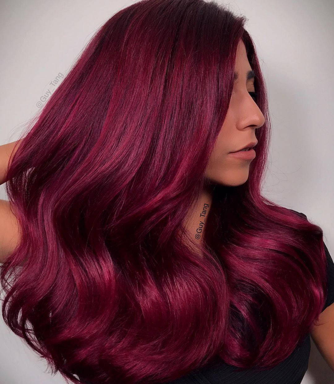 Caption: Woman With Magenta Hair Side View Wallpaper