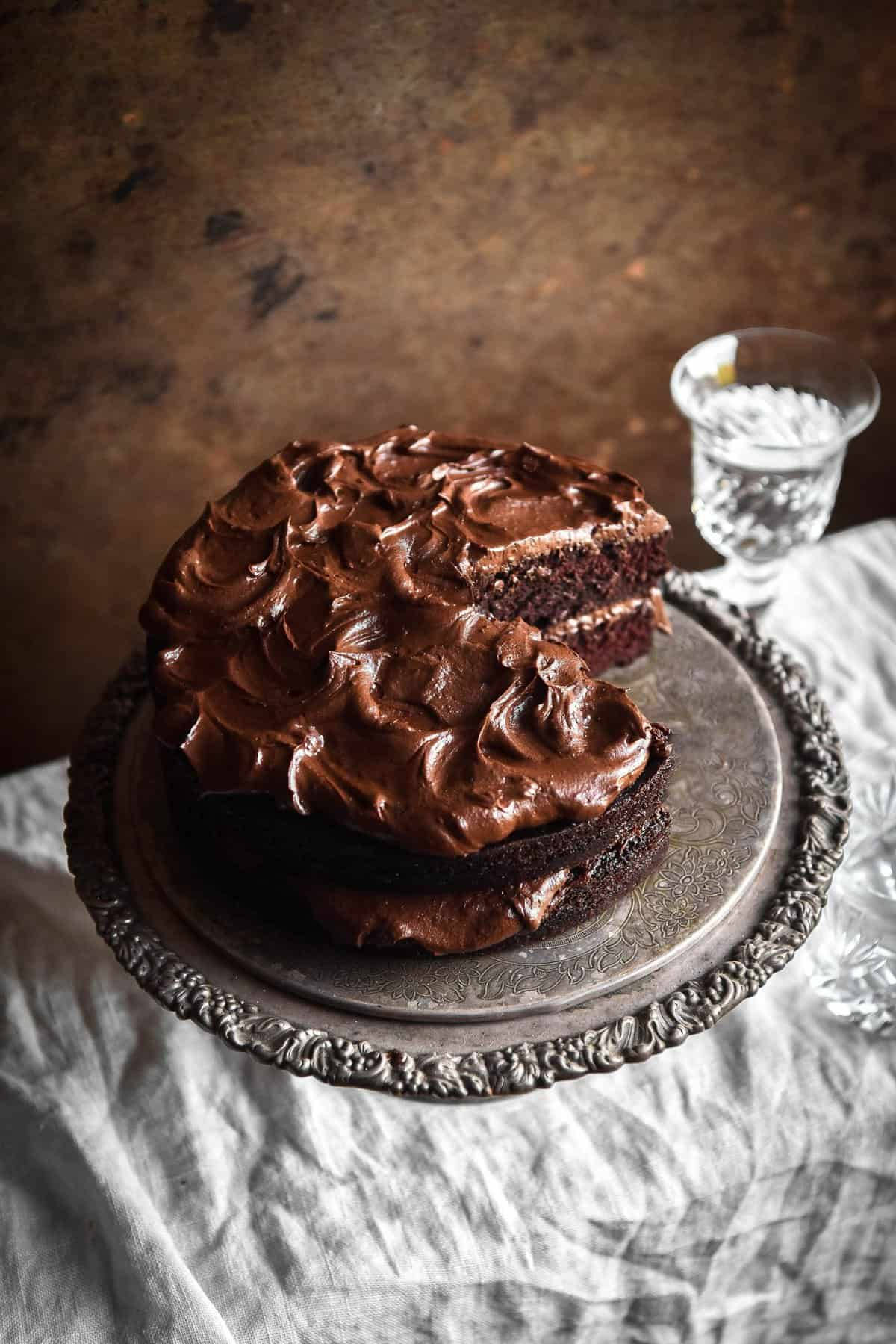 Captivating Vertical Shot Of Decadent Chocolate Cake Wallpaper