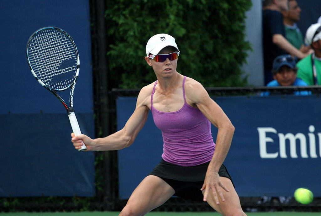 Cara Black In Action With Her Tennis Racket Wallpaper