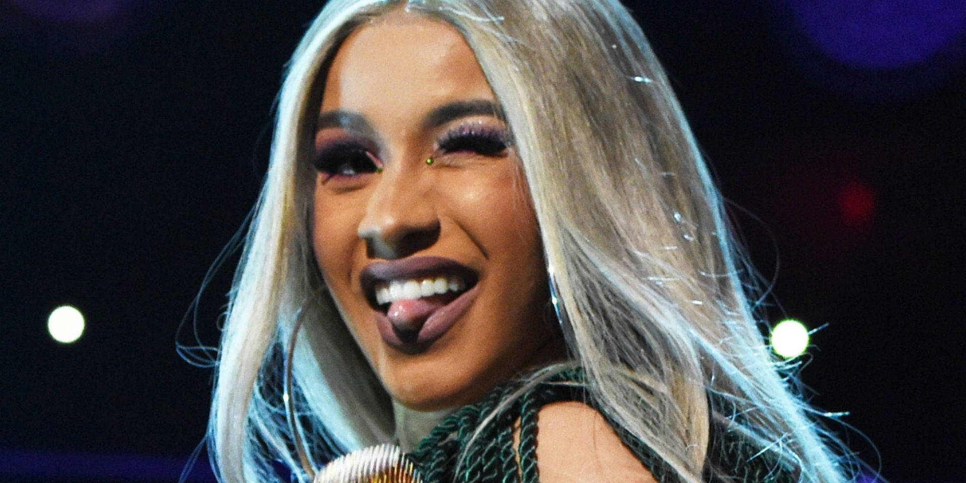 Download free Cardi B Winking With Tongue Out Wallpaper - MrWallpaper.com