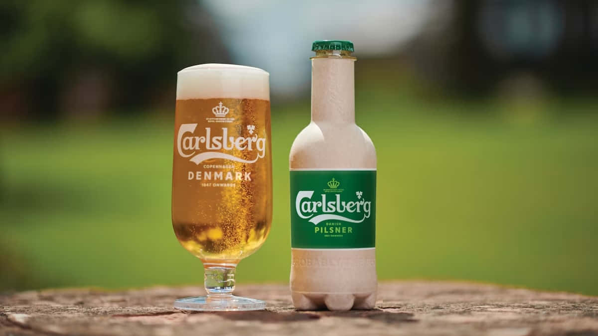 Carlsberg Beer Glassand Bottle Wallpaper