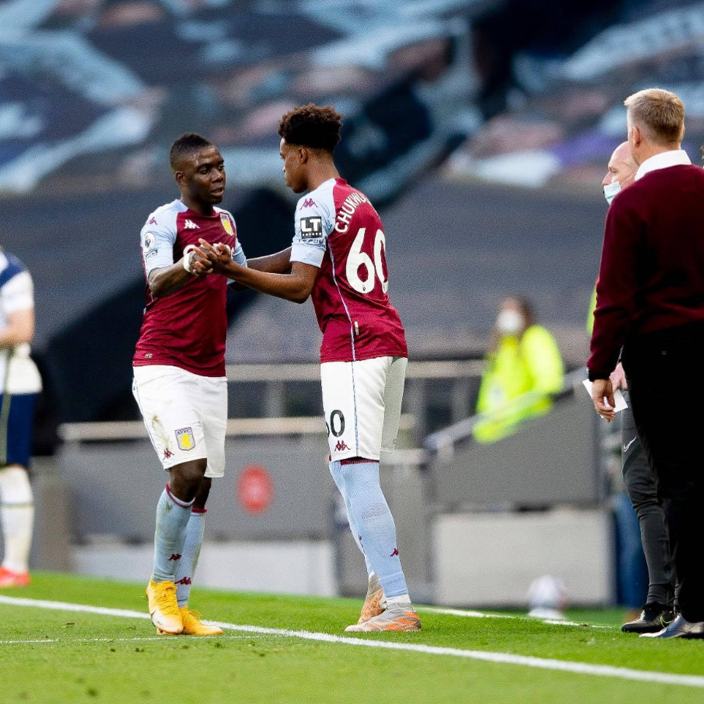 Carney Chukwuemeka High Five With Teammate Wallpaper