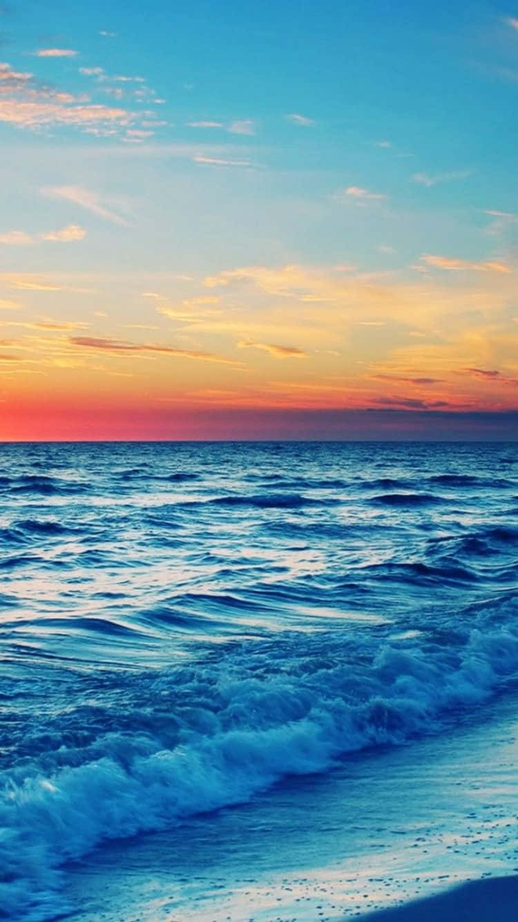 Catch The Sun's Last Rays Before The Day Comes To An End At Sunset Beach Wallpaper