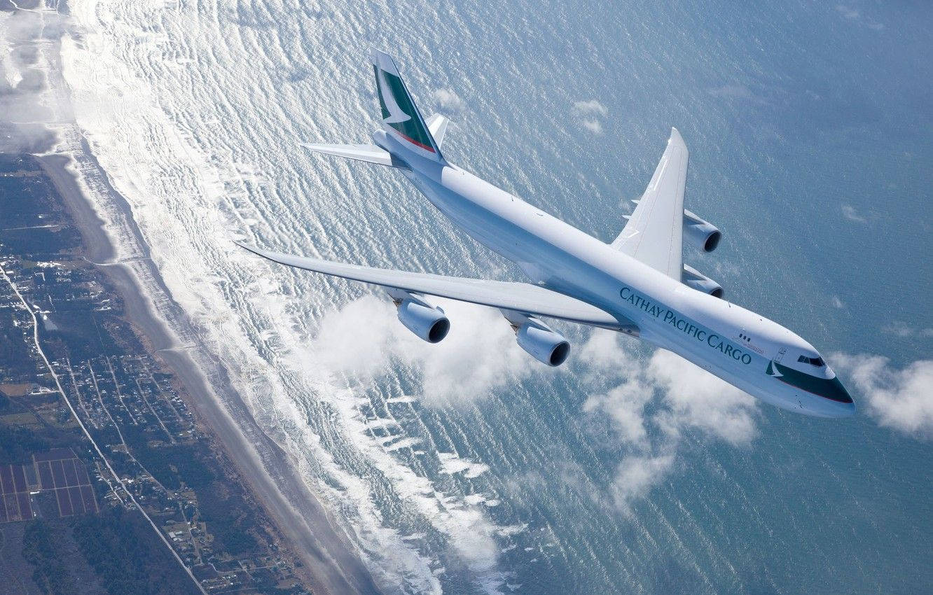 Cathay Pacific Plane Seashore Wallpaper