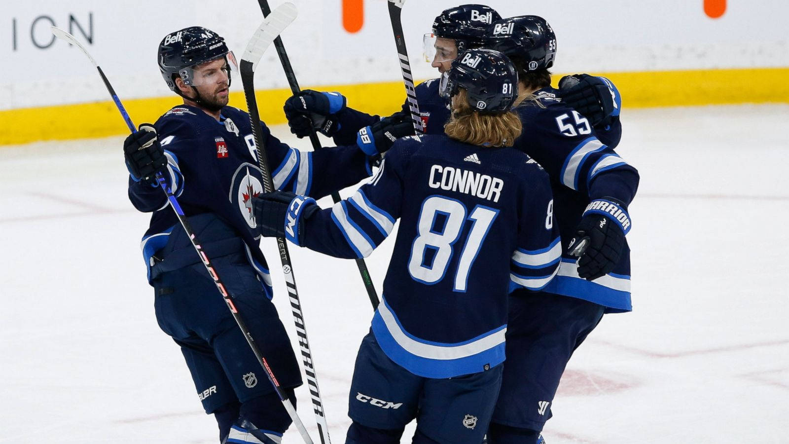 Celebrating Winnipeg Jets Kyle Connor And Teammates Wallpaper