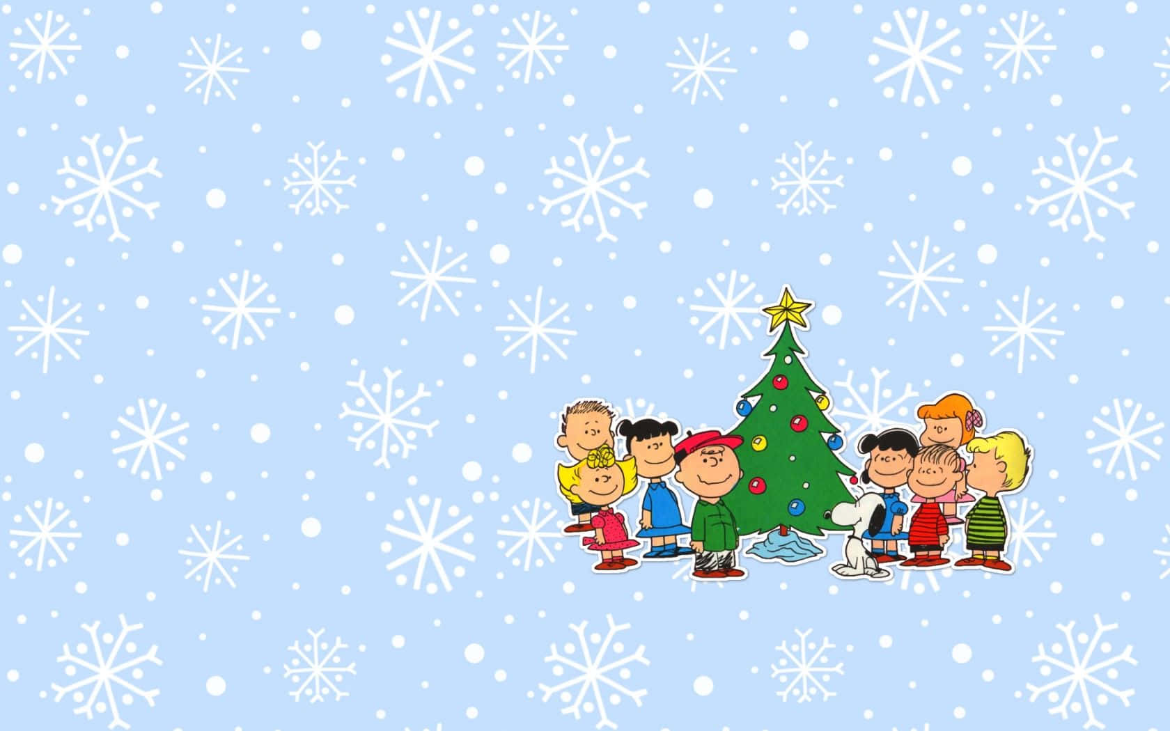 Charlie Brown Family Around A Christmas Tree Wallpaper