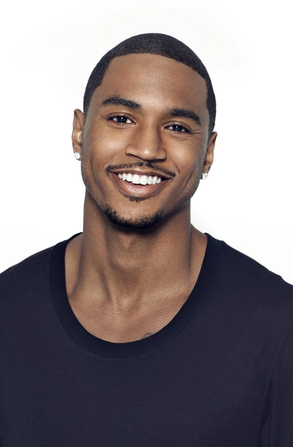 Charming Black Man With An Endearing Smile Wallpaper