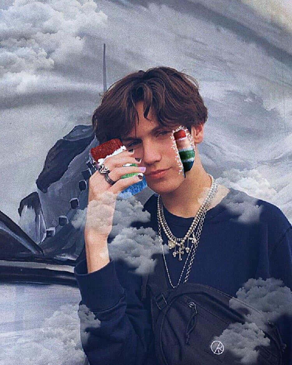 Chase Hudson In Front Of Street Art Wallpaper