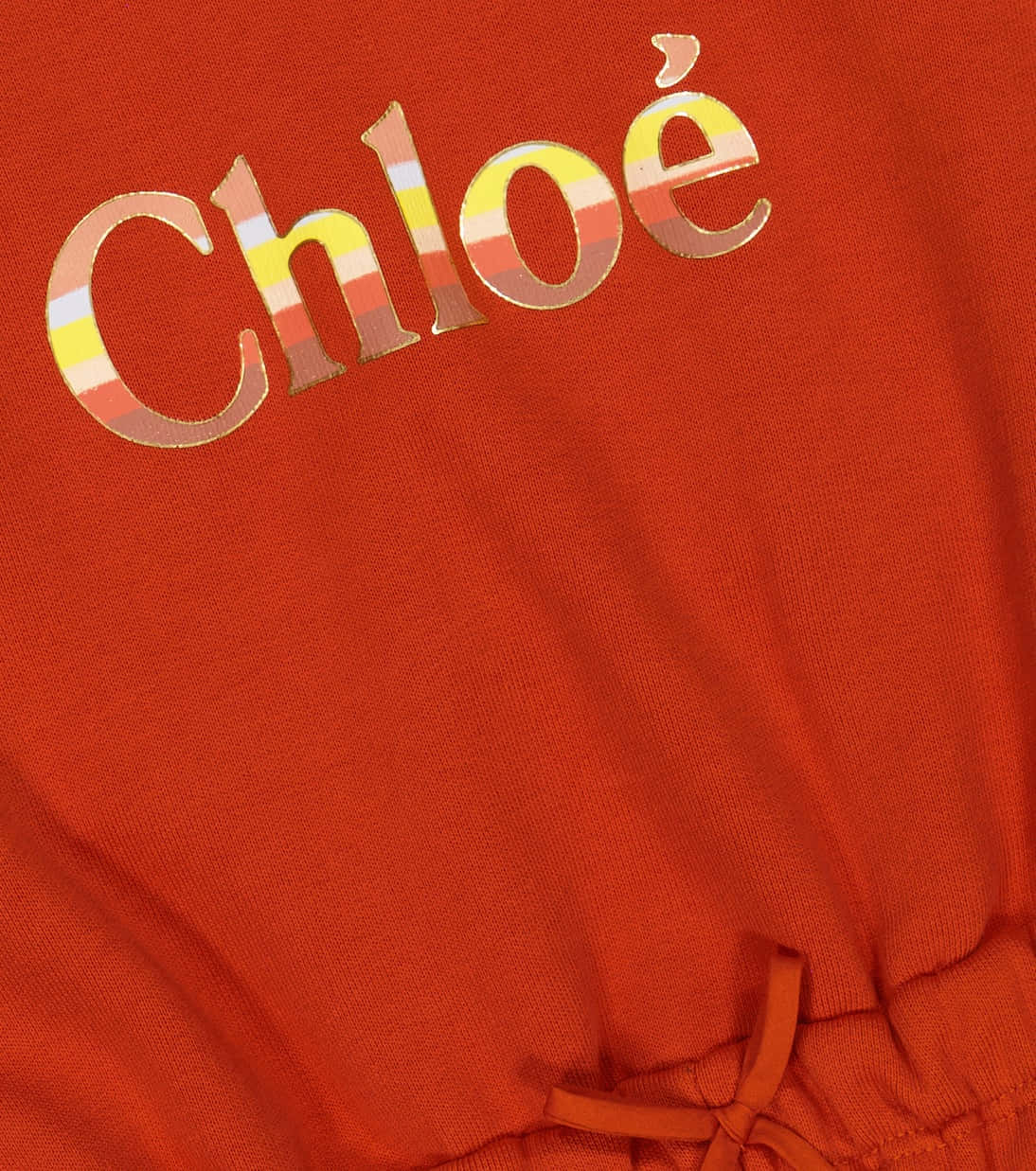 Chloe Branded Orange Fabric Closeup Wallpaper