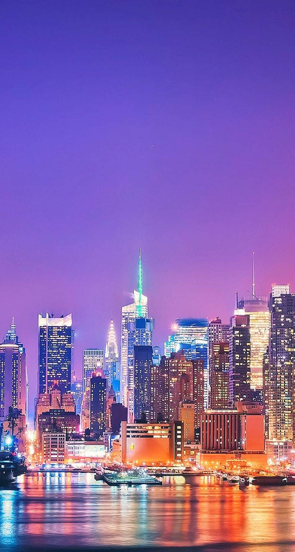 City Lights And Purple Sky Dazzling Nyc Phone Wallpaper