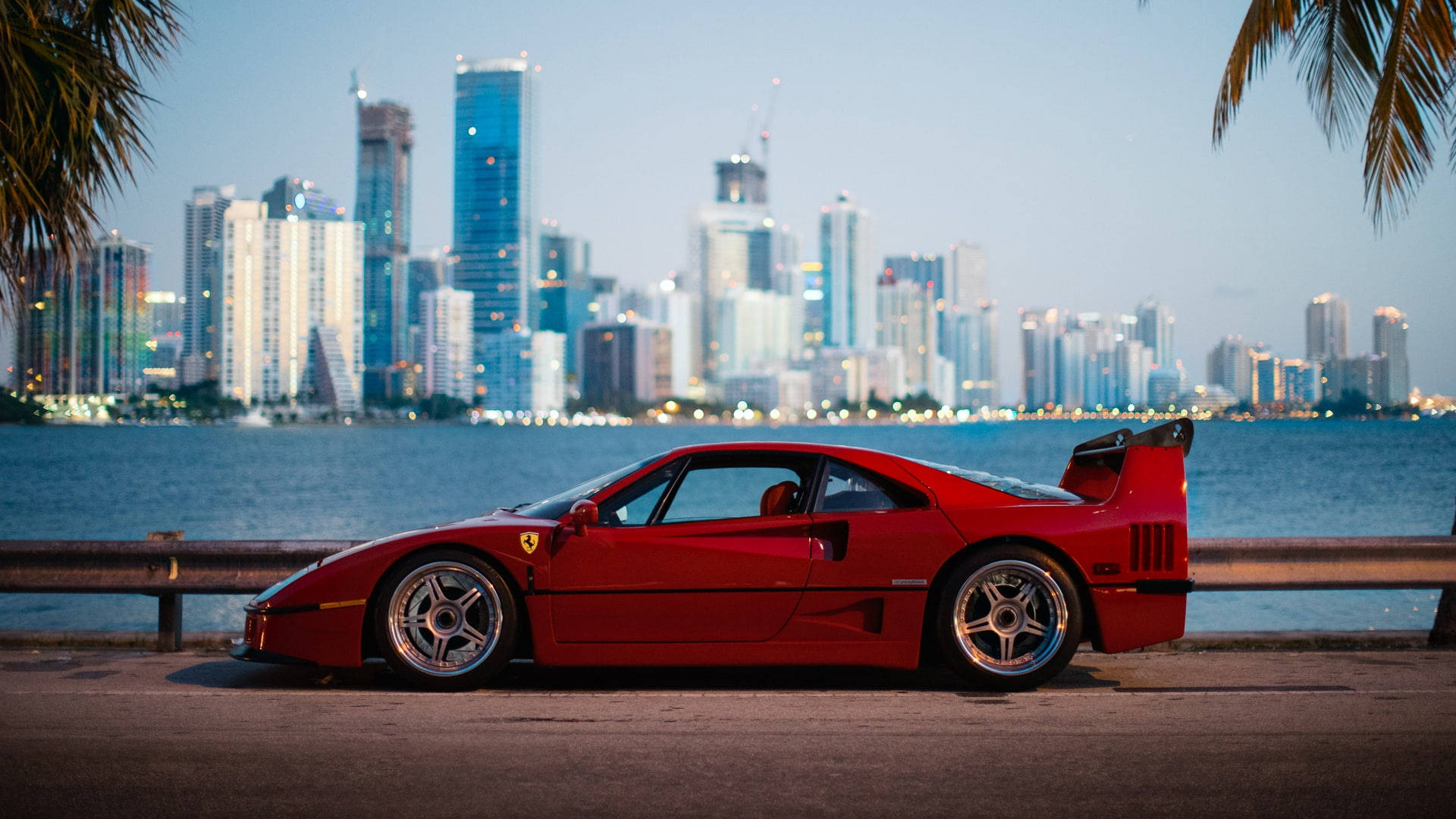 Cityscapes And Red Ferrari Ipad Wallpaper