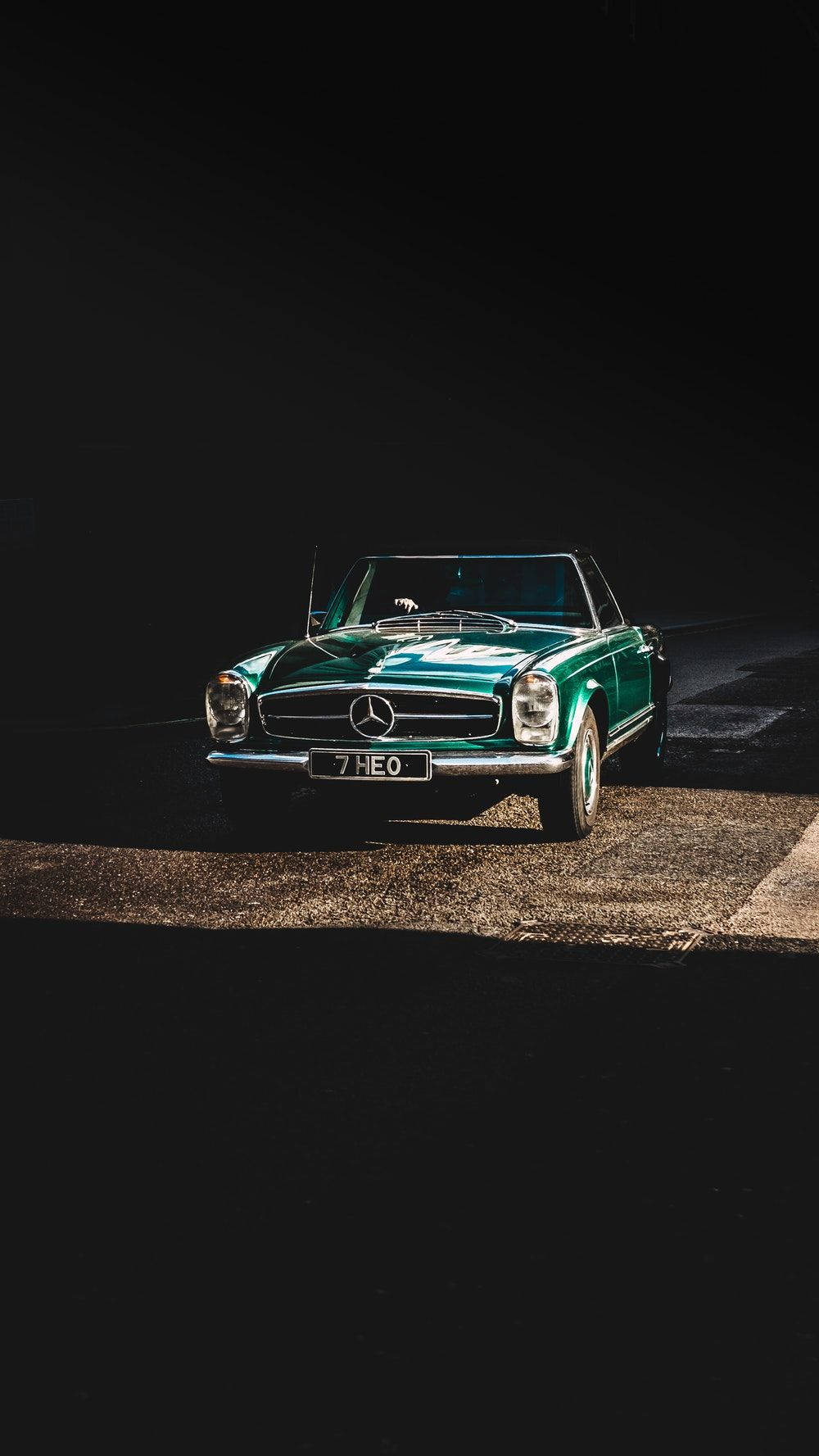 Classic Green Mercedes-benz On The Road Wallpaper