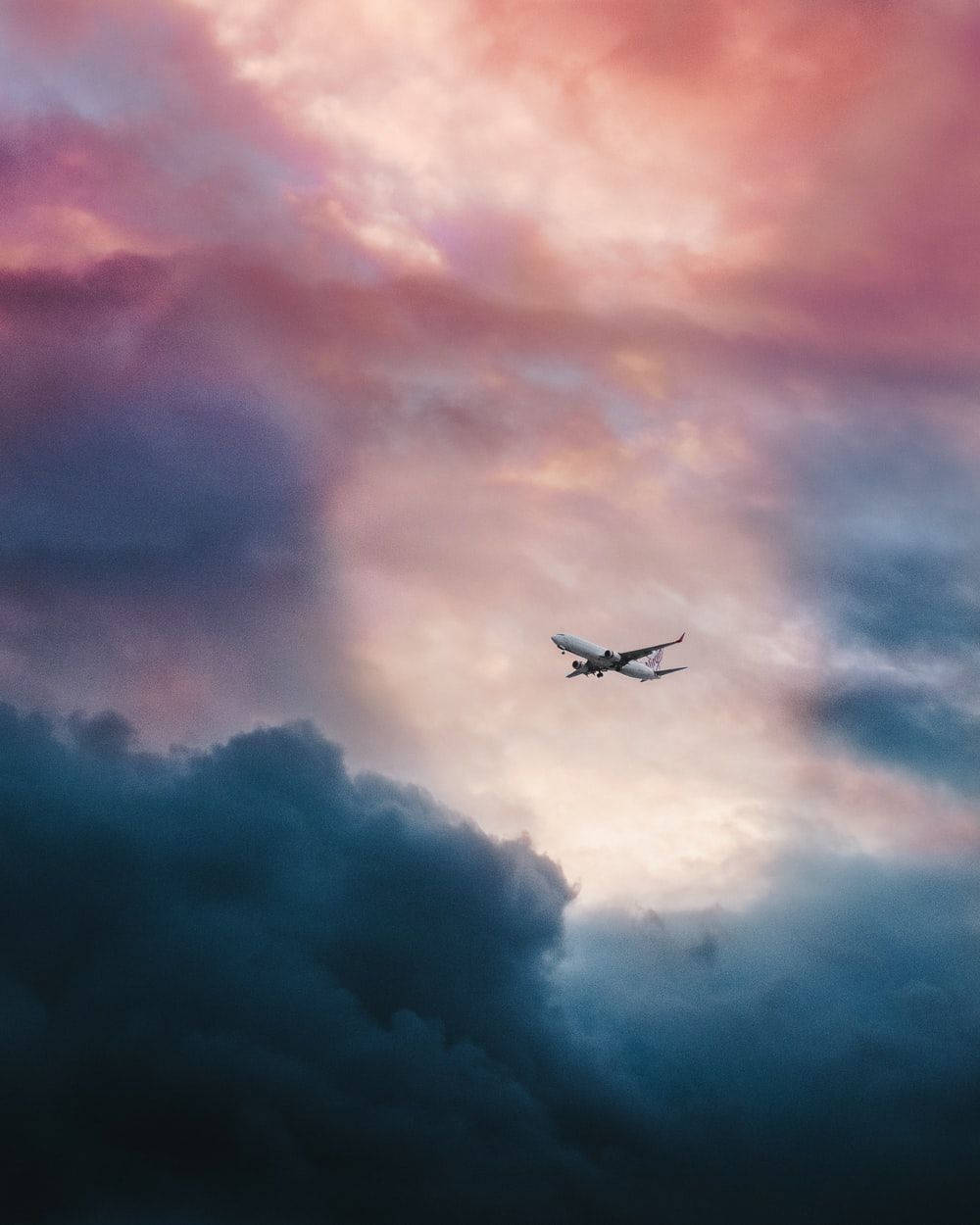 Cloudy Sky With Airplane Android Wallpaper