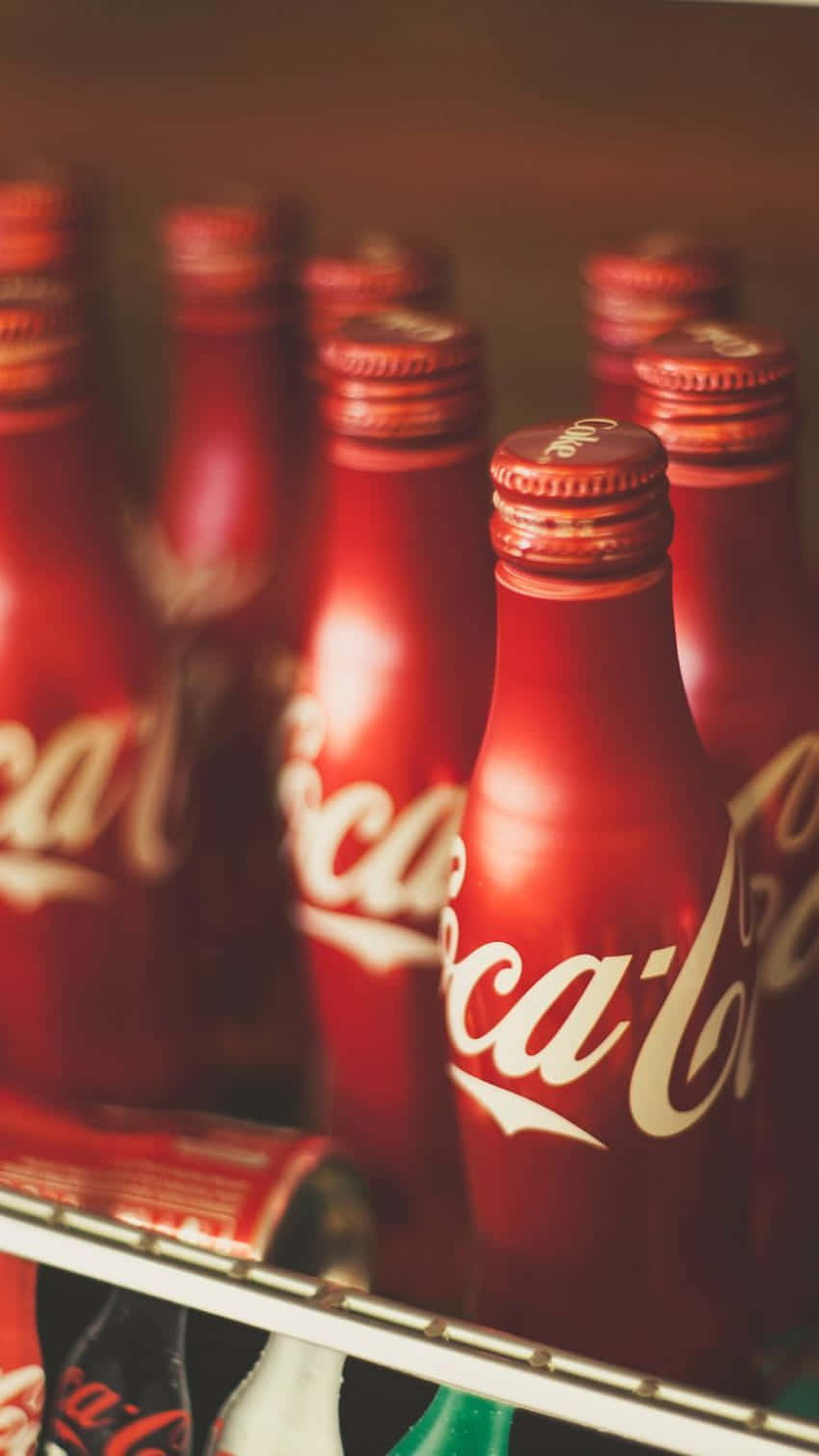 Coca Cola Bottles In A Refrigerator Wallpaper