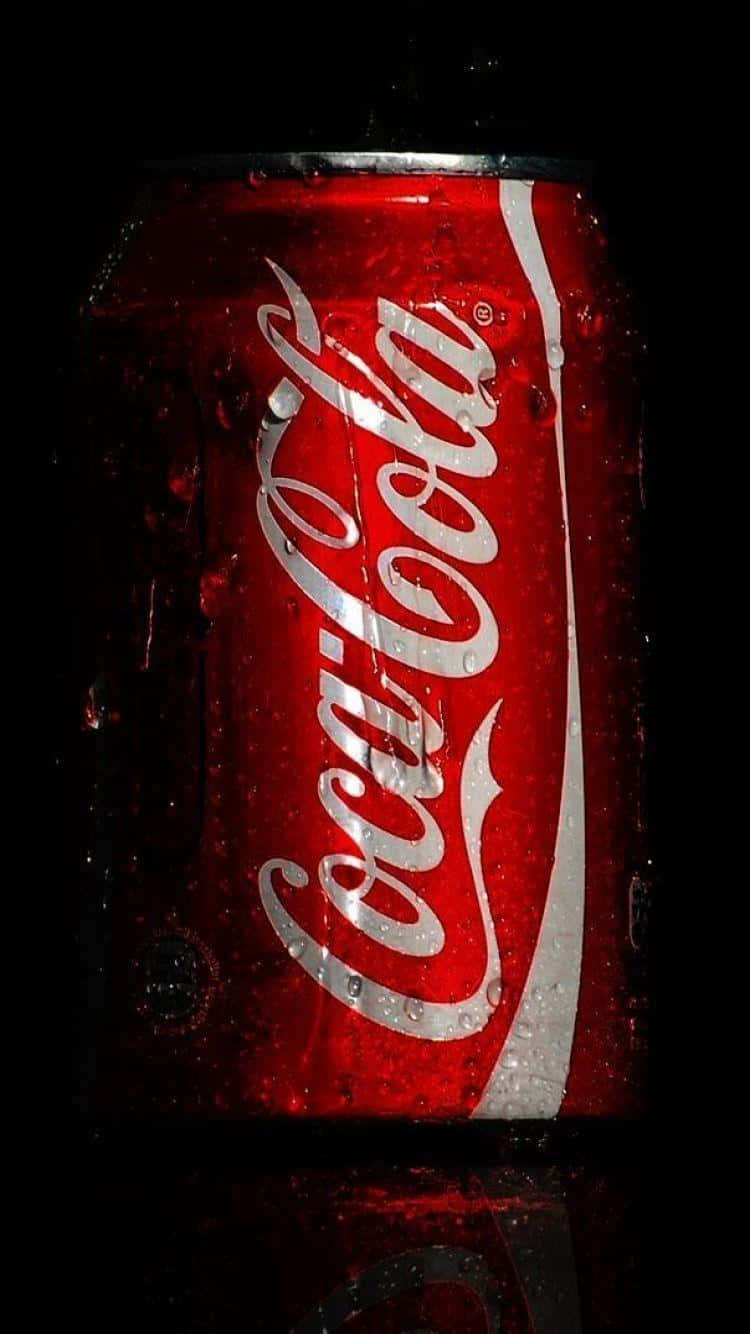 Coca Cola Can On A Black Background Wallpaper