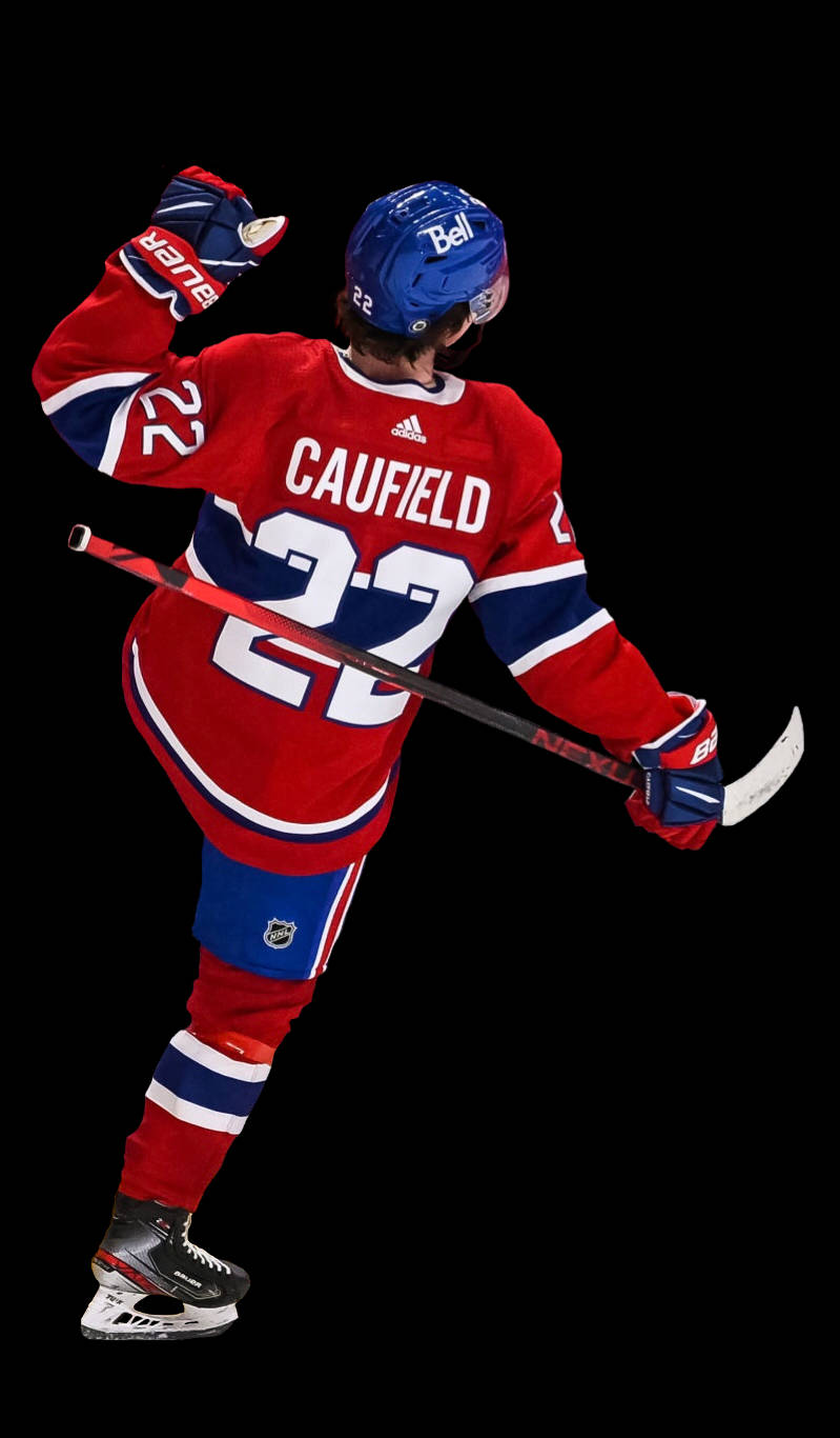 Cole Caufield Hitting Goal Pose Wallpaper