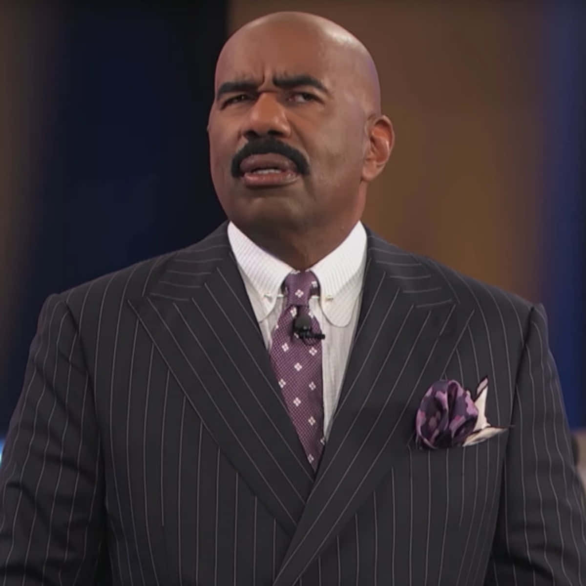 Comedian And Tv Host Steve Harvey With A Surprised Expression. Wallpaper