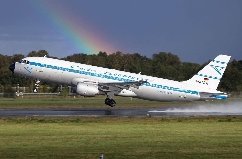 Condor Airlines Plane Take Off With Rainbow Wallpaper