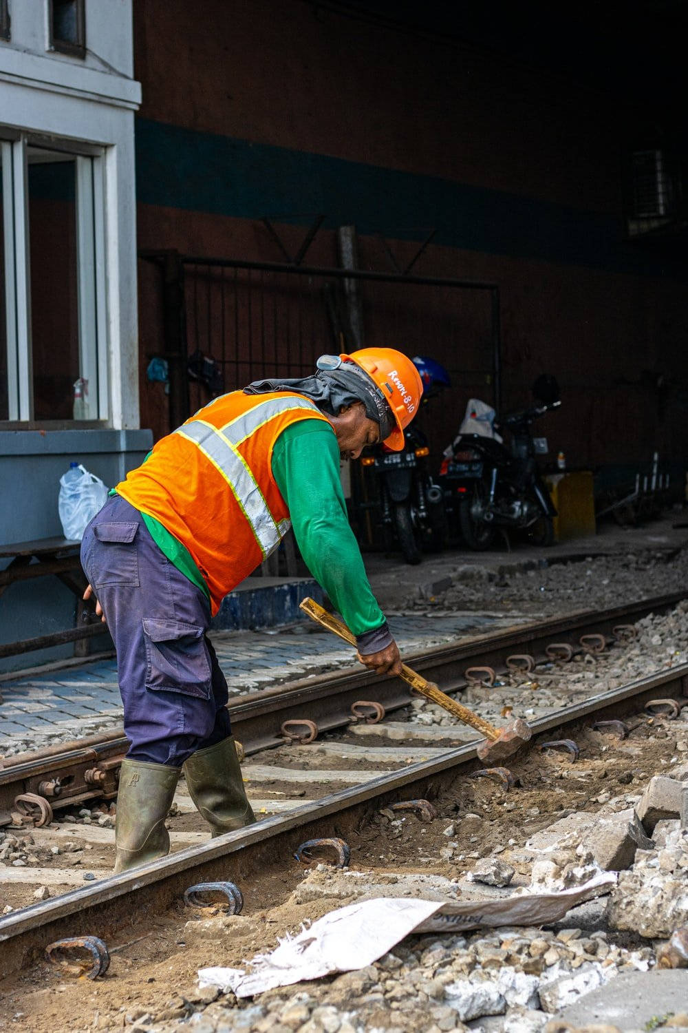 Construction Worker Smashing The Metal Wallpaper