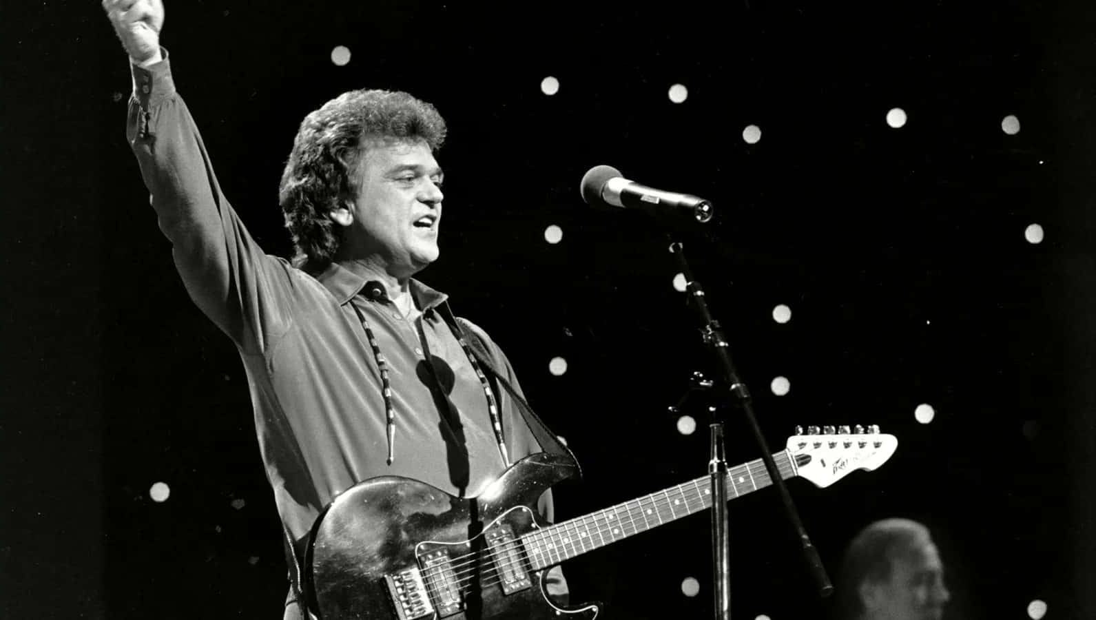 Conway Twitty Performingon Stage.jpg Wallpaper