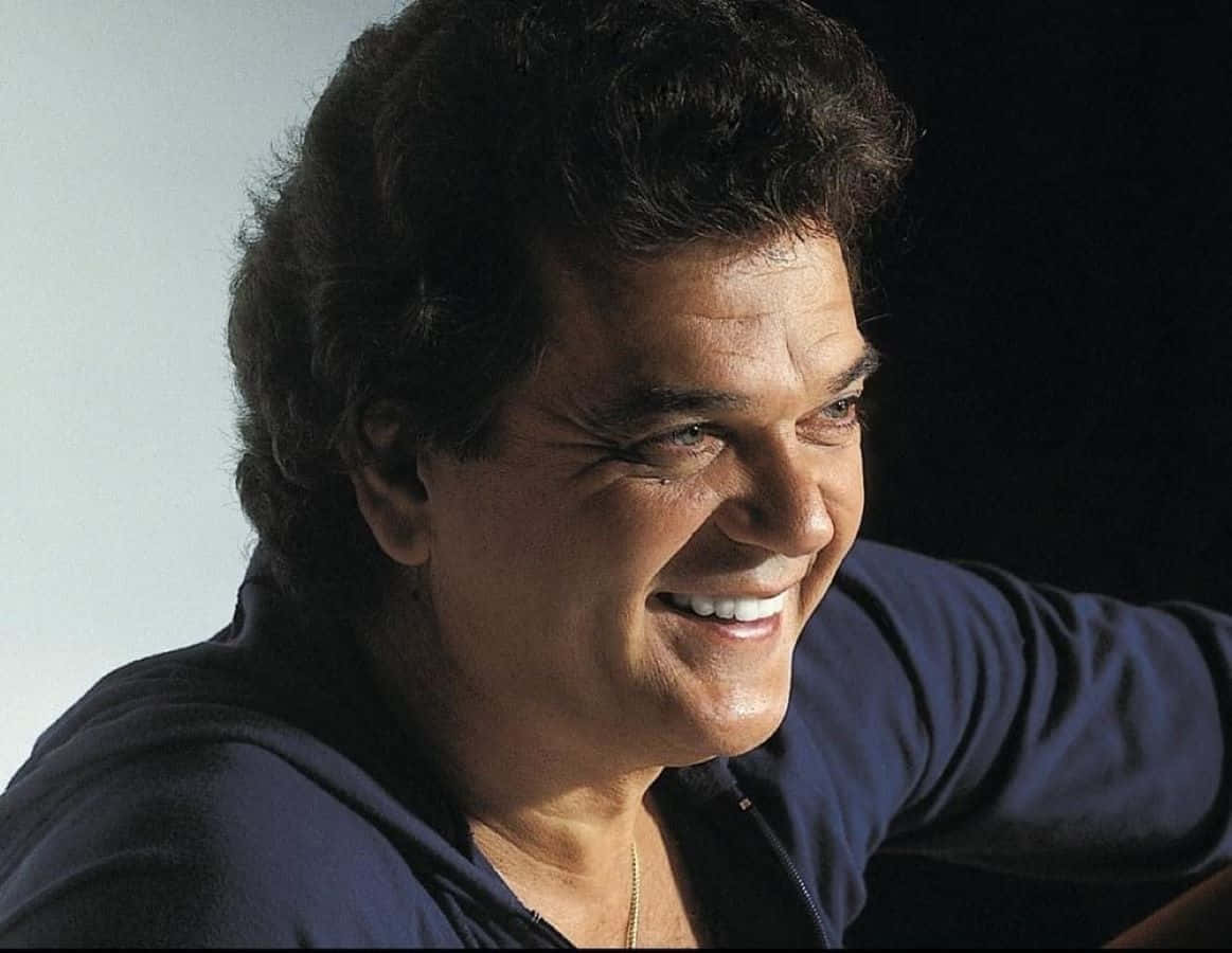 Conway Twitty Smiling Portrait Wallpaper