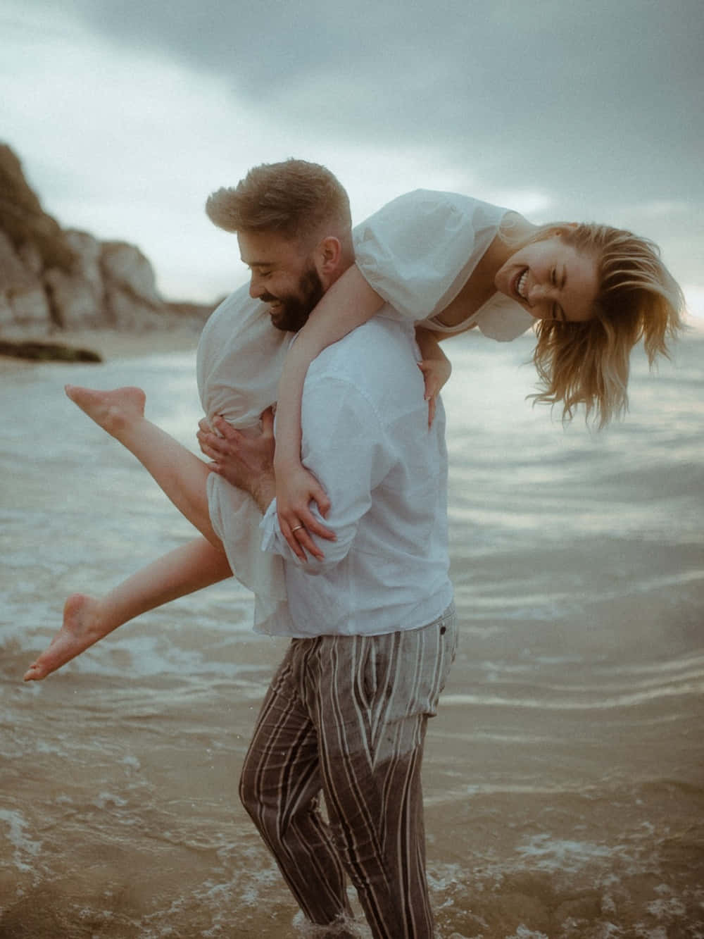 Couple At Beach Engagement Shot Wallpaper