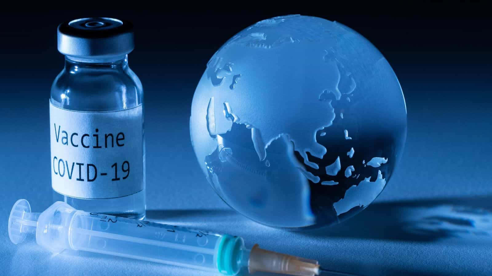 Covid-19 Vaccine Syringe And Earth Globe Wallpaper