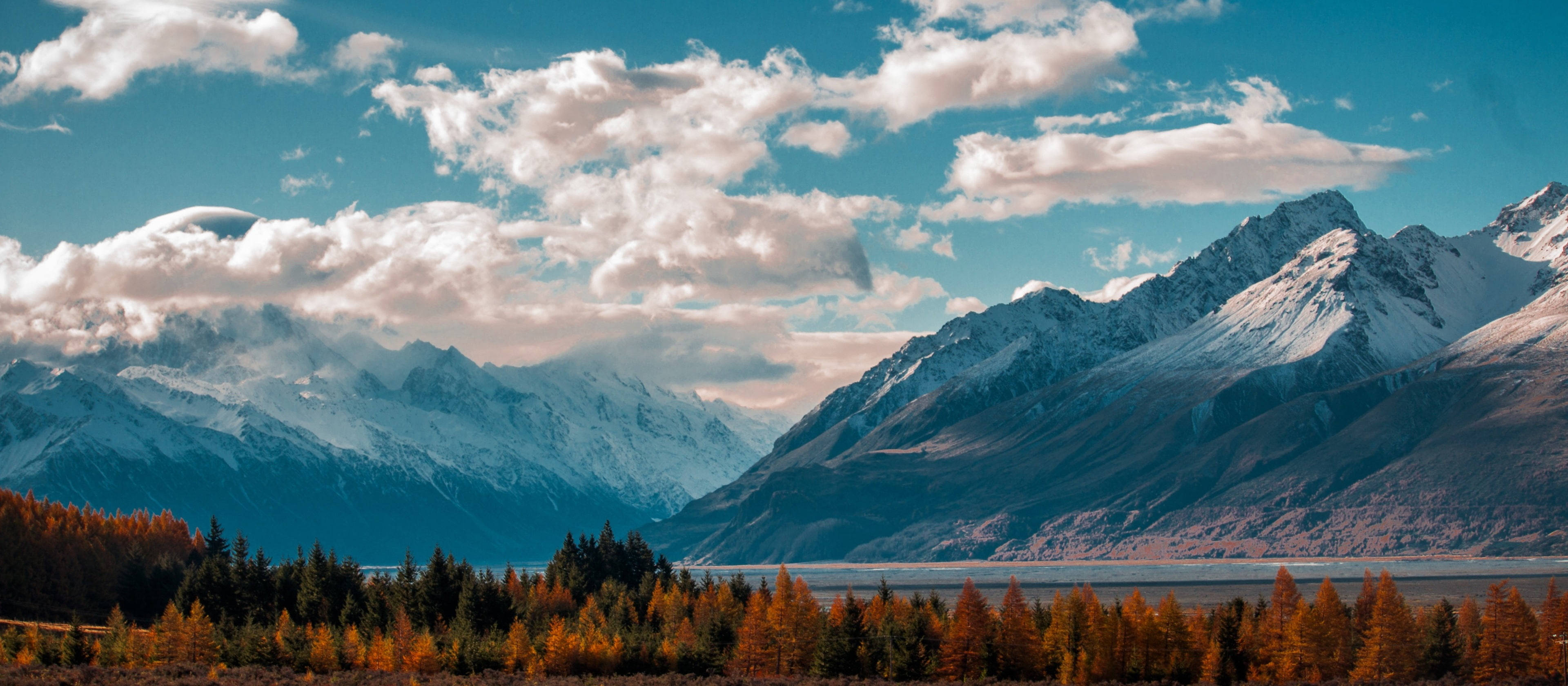 Crisp Cloudy Mountains Professional Desktop Wallpaper