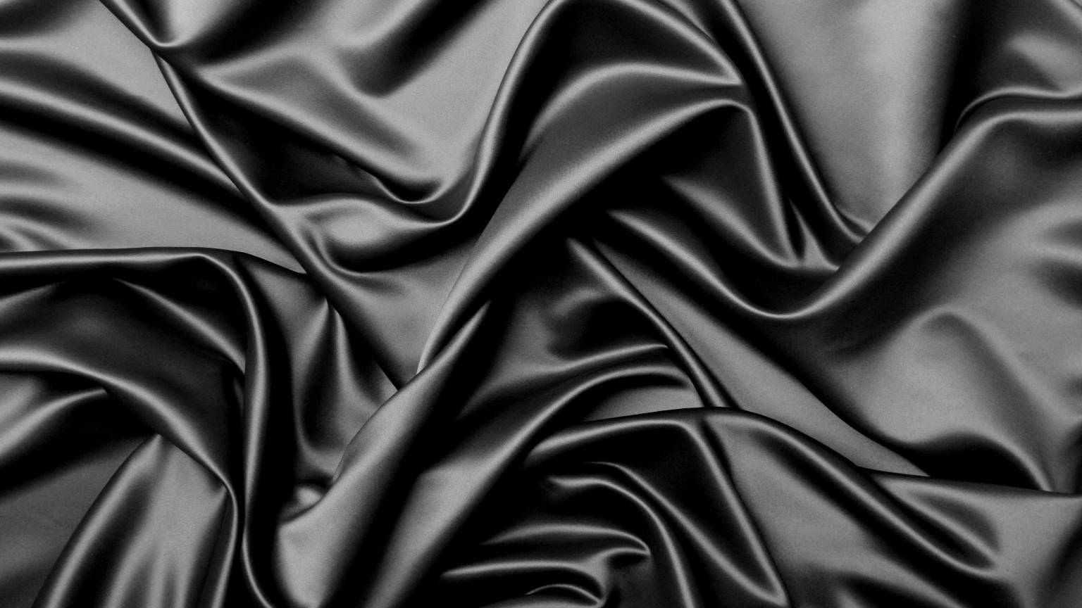 Crumpled Satin On Black Tablet Wallpaper